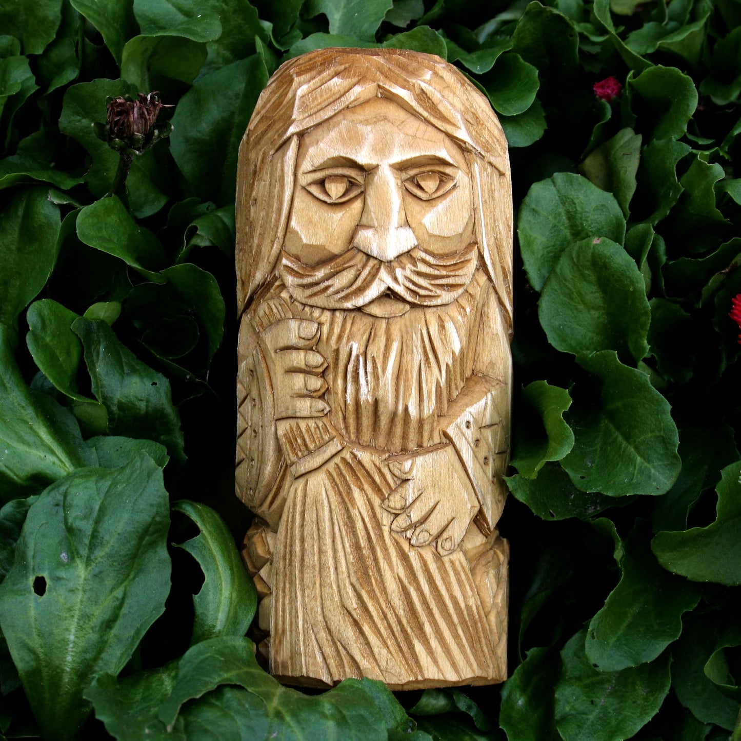 Slavic wooden statues lying arrangement hand carved