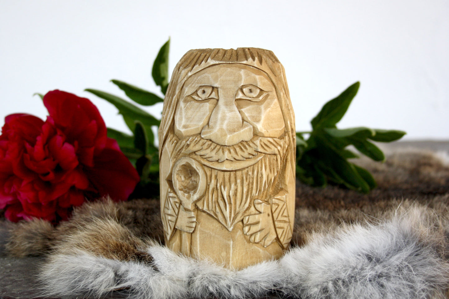Wooden figurine of Domovoy. Good Slavic brownie spirit whith spoon