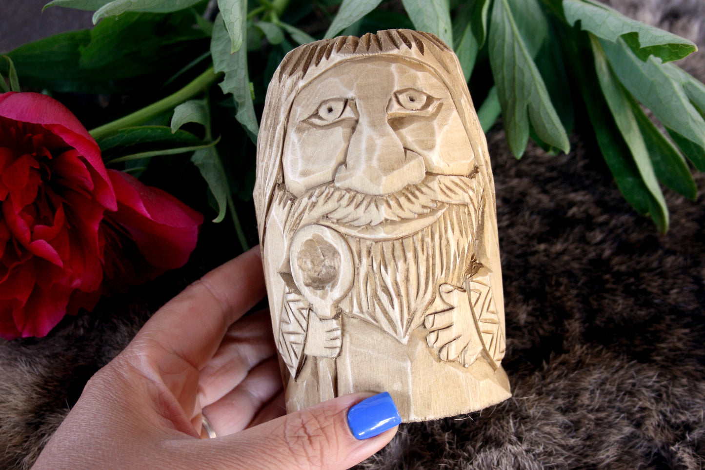 Wooden figurine of Domovoy. Good Slavic brownie spirit whith spoon