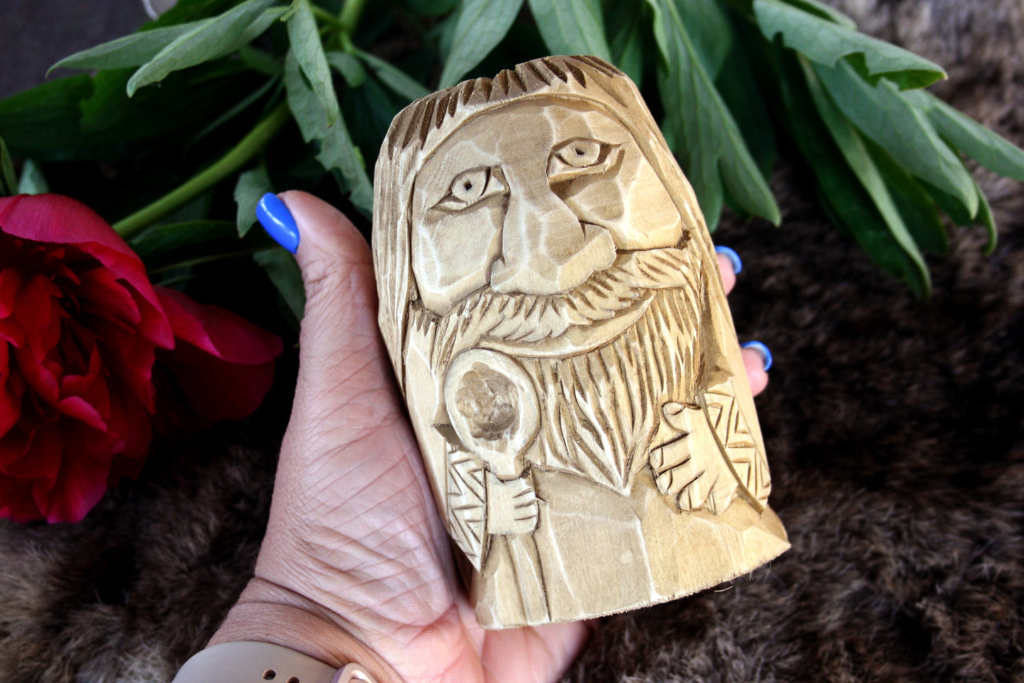 Wooden figurine of Domovoy. Good Slavic brownie spirit whith spoon