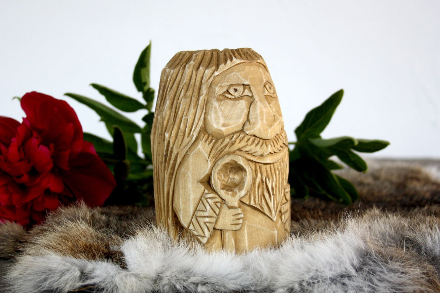 Wooden figurine of Domovoy. Good Slavic brownie spirit whith spoon