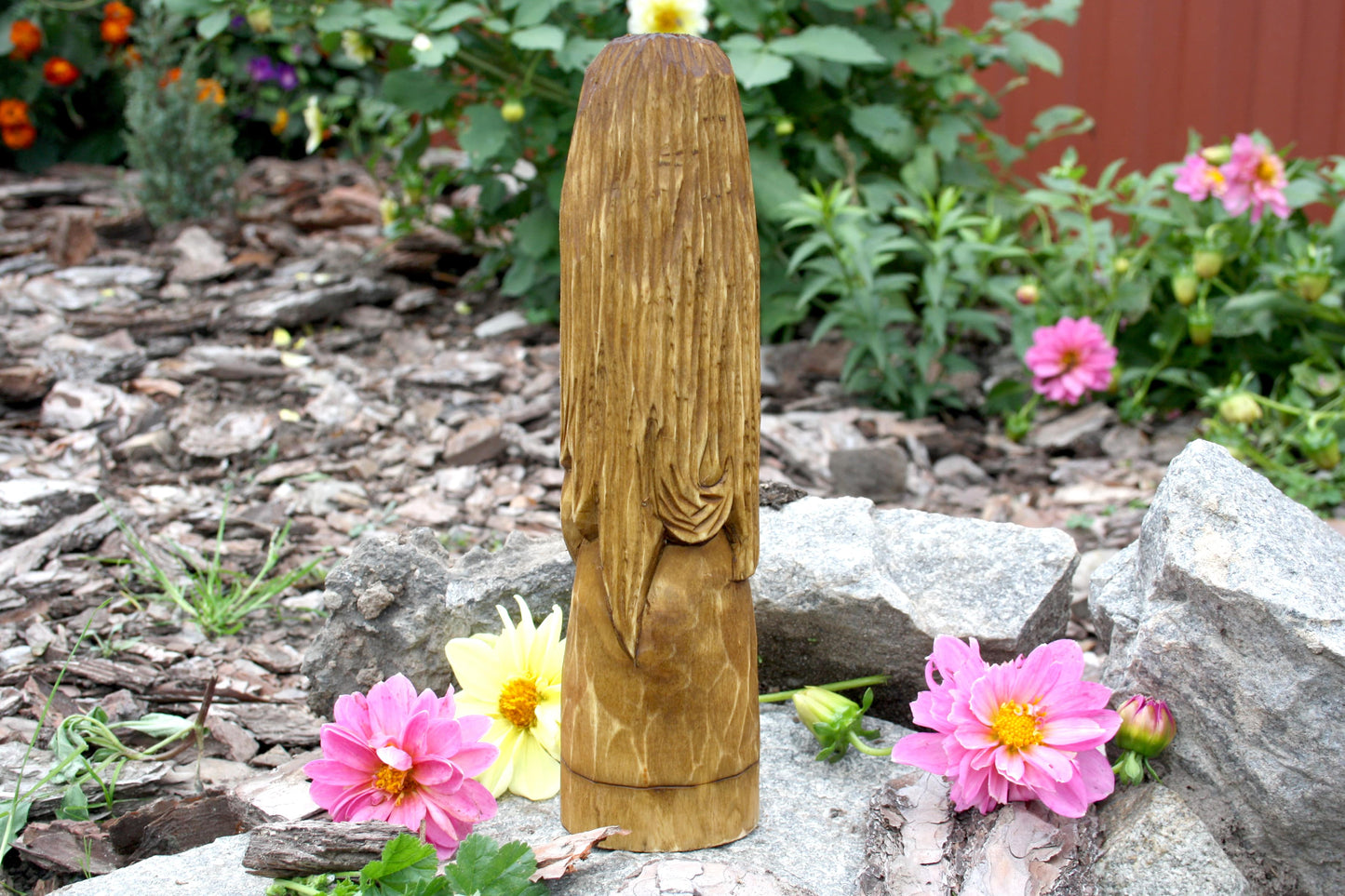 Big wooden statue of brighid. celtic statue