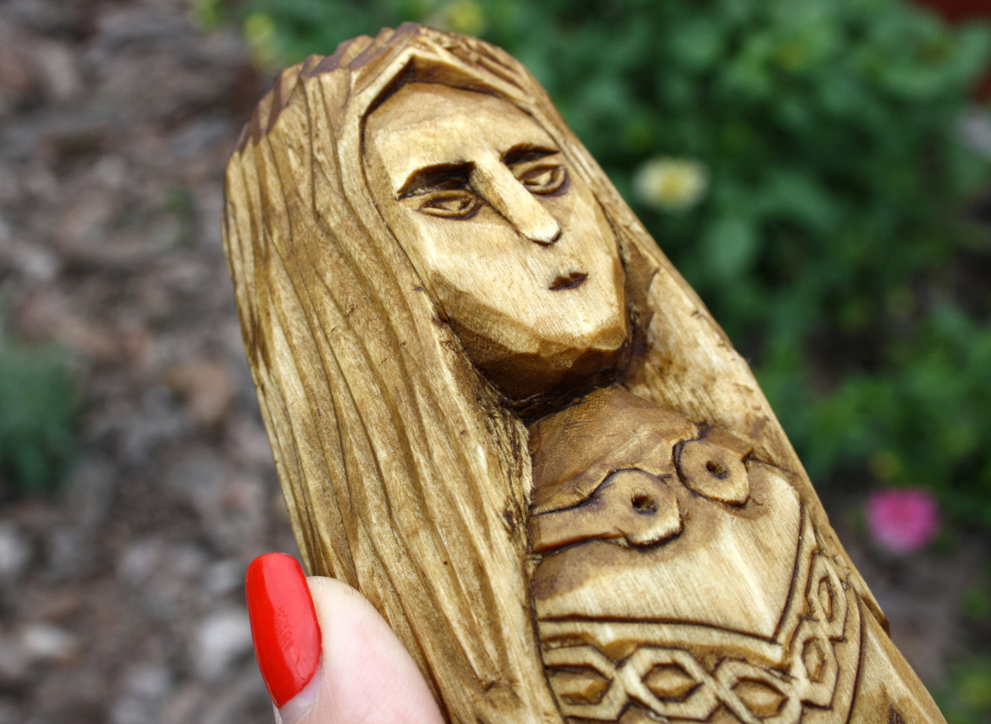 Big wooden statue of brighid. celtic altar statues
