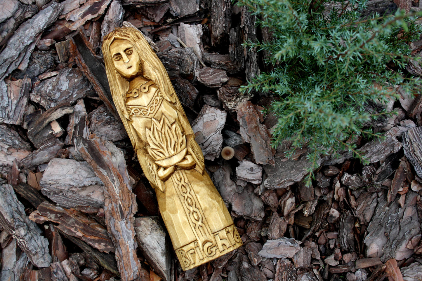 Big wooden statue of brighid. celtic god statues