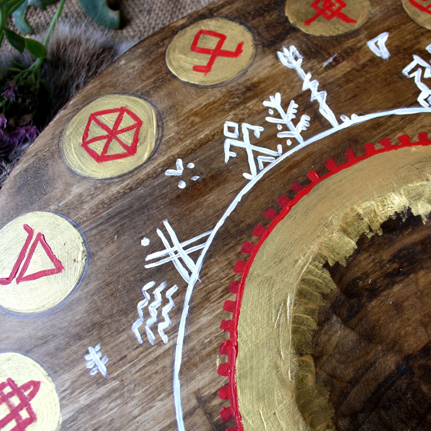 Round altar for the gods with runes