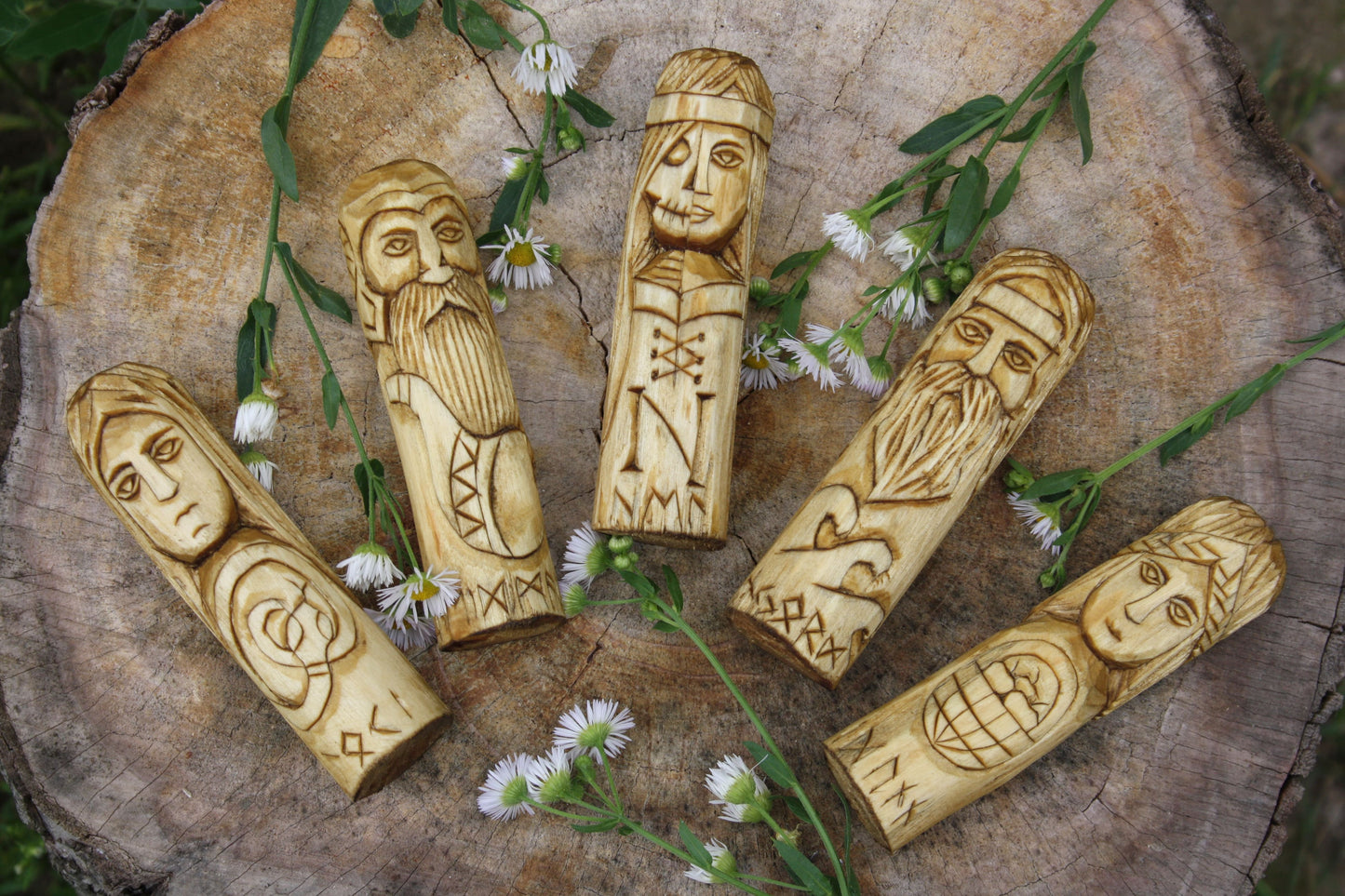 Small wooden altar of norse gods hela loki idunna njord heimdall. njord. heimdall. statue celtic