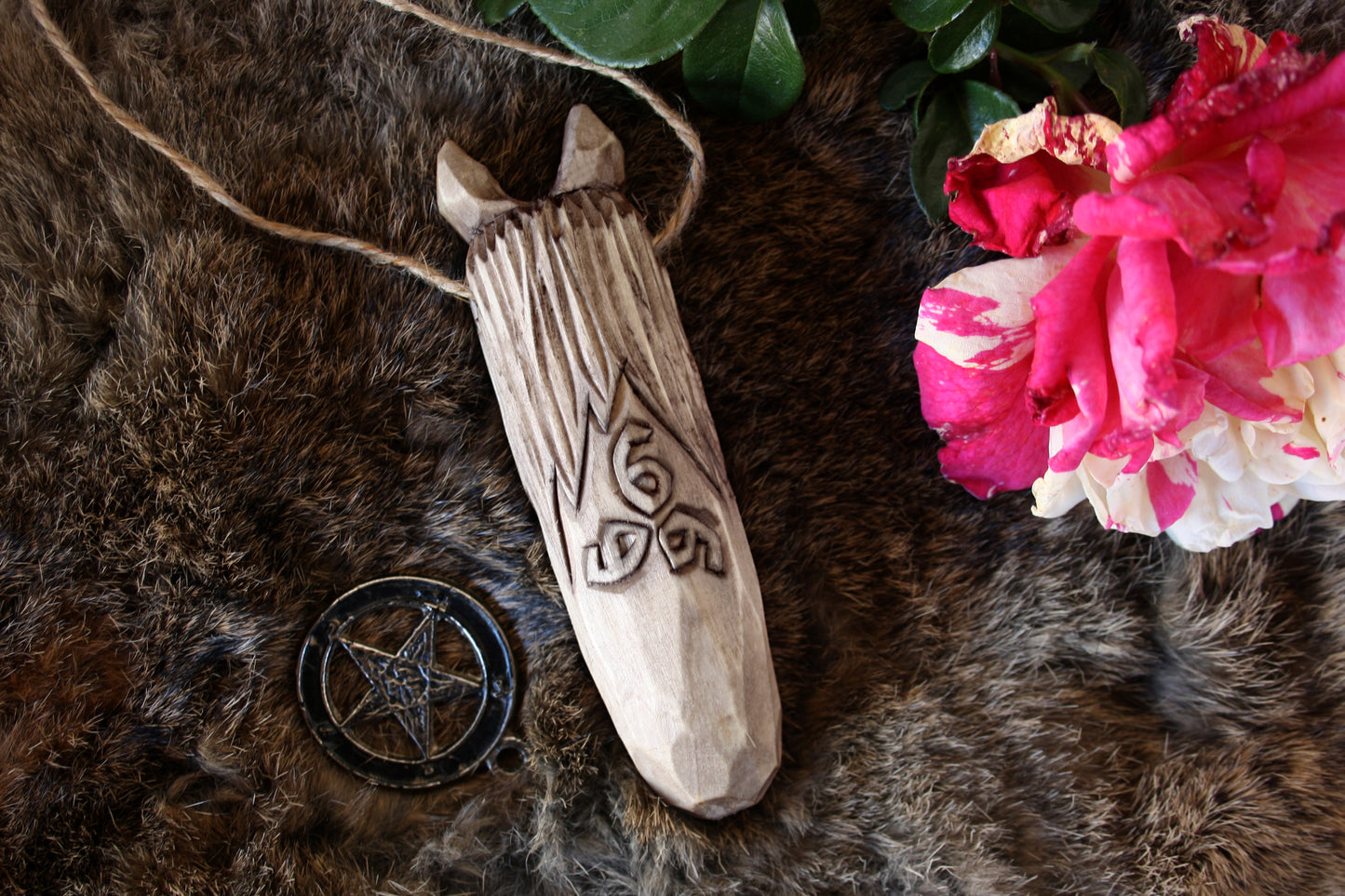 Pendant amulet of Lucifer. Wooden amulet of demon Lucifer