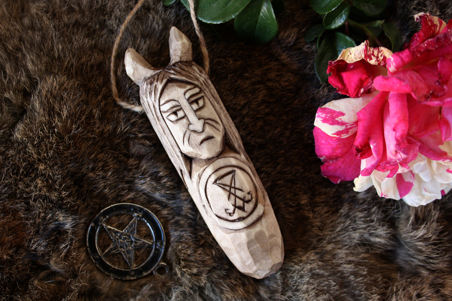 Pendant amulet of Lucifer. Wooden amulet of demon Lucifer