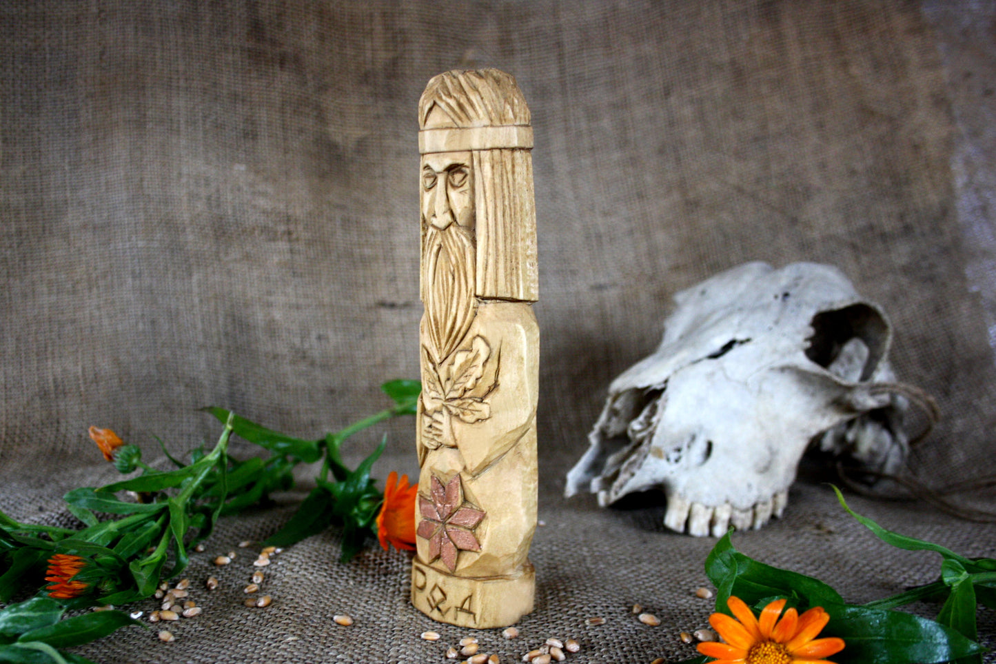 Hand carved figurine of the Slavic god Rod