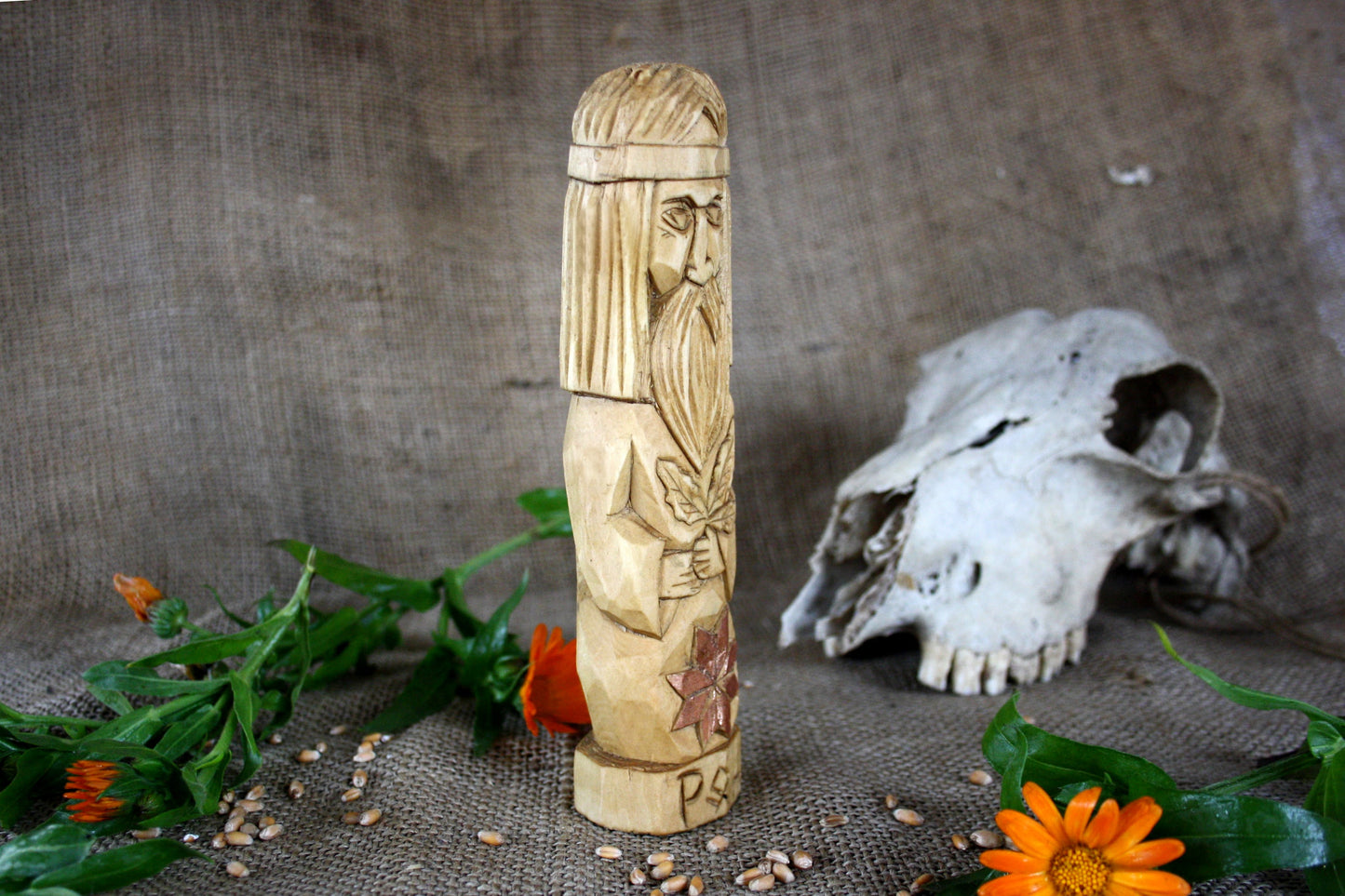 Hand carved figurine of the Slavic god Rod