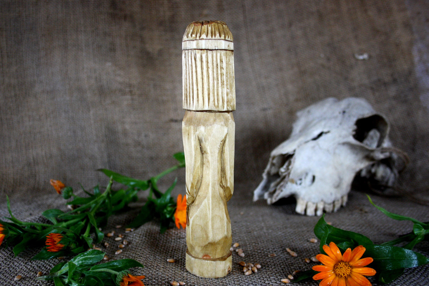 Hand carved figurine of the Slavic god Svarog