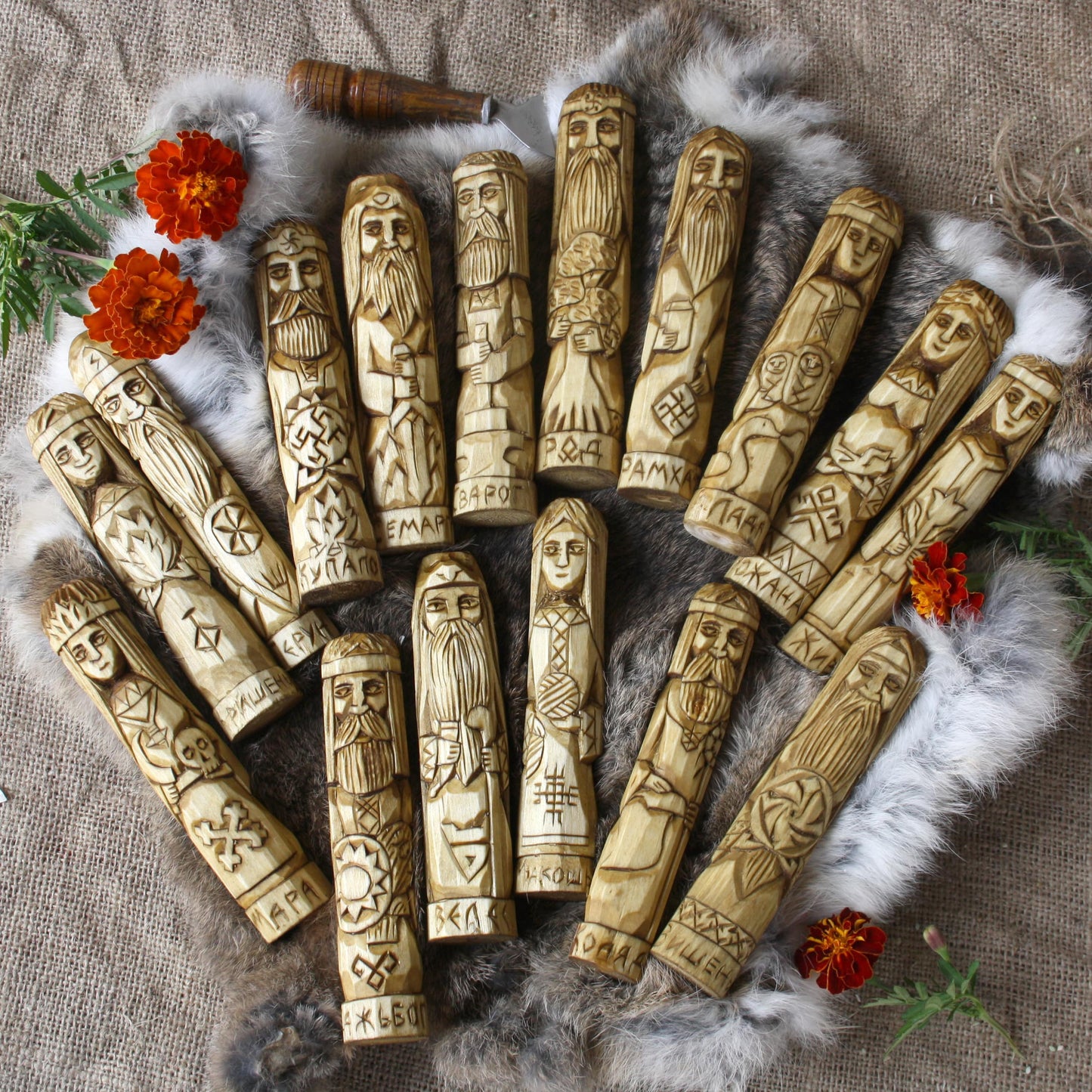 Full Slavic pantheon wooden statues lying arrangement hand carved Slavic gods