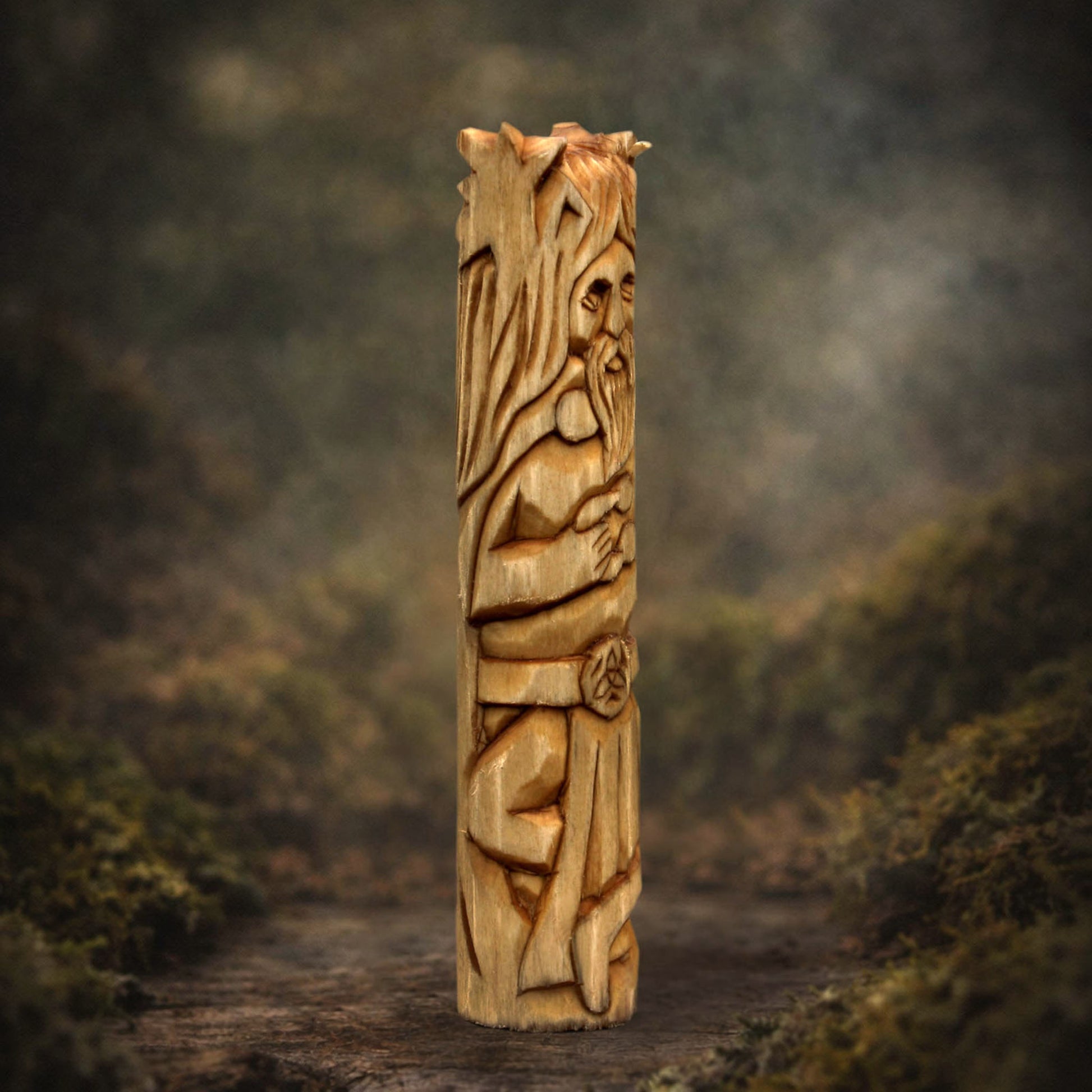 Side view of wooden Cernunnos figurine showing carving texture