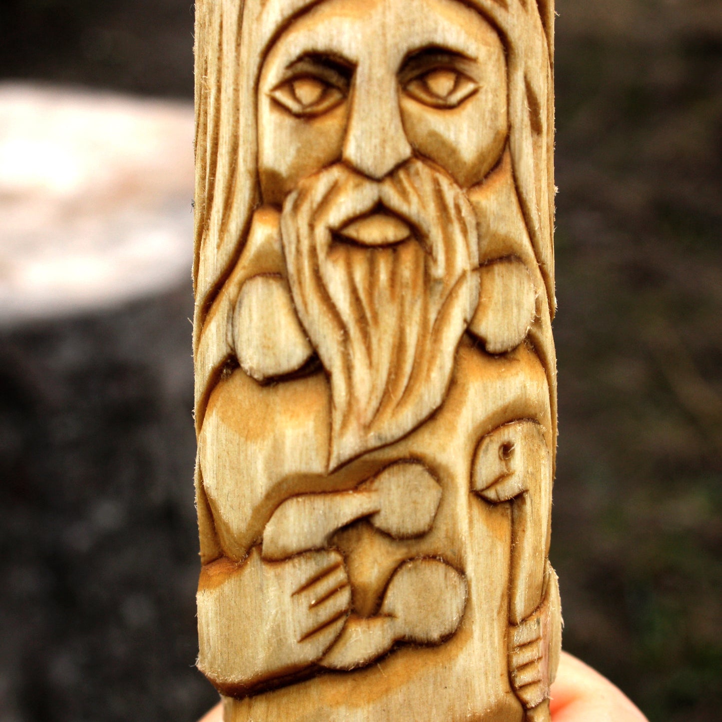 Close-up of hand-carved Cernunnos wooden statue details