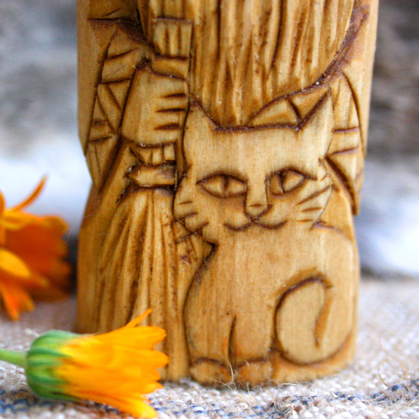 Close-up of wooden Domovoy figurine carving details