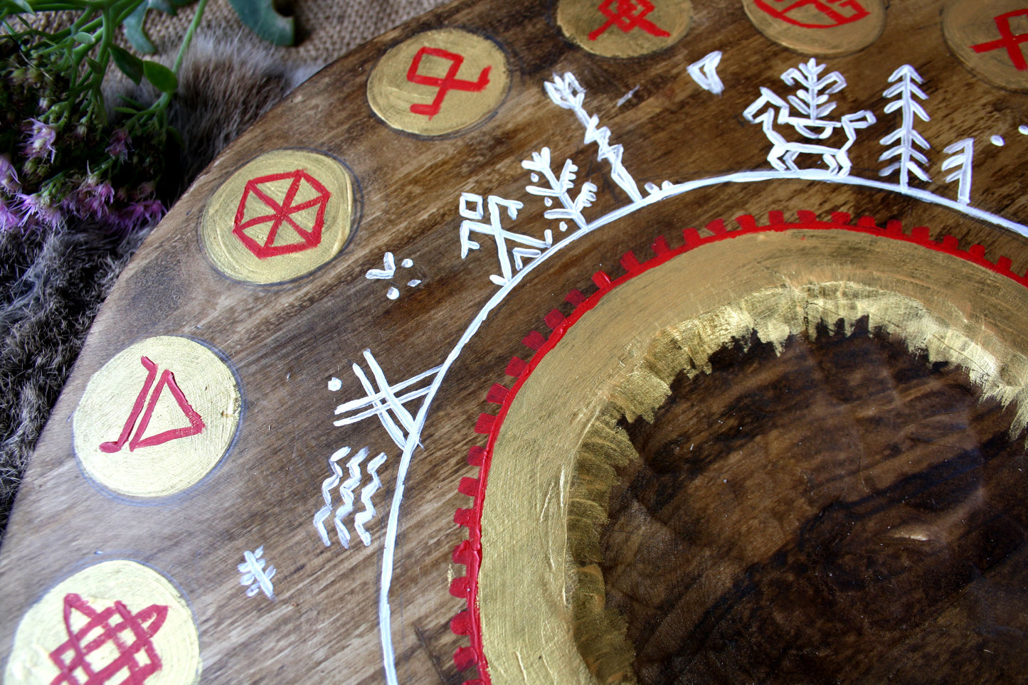 Round altar for the gods with runes