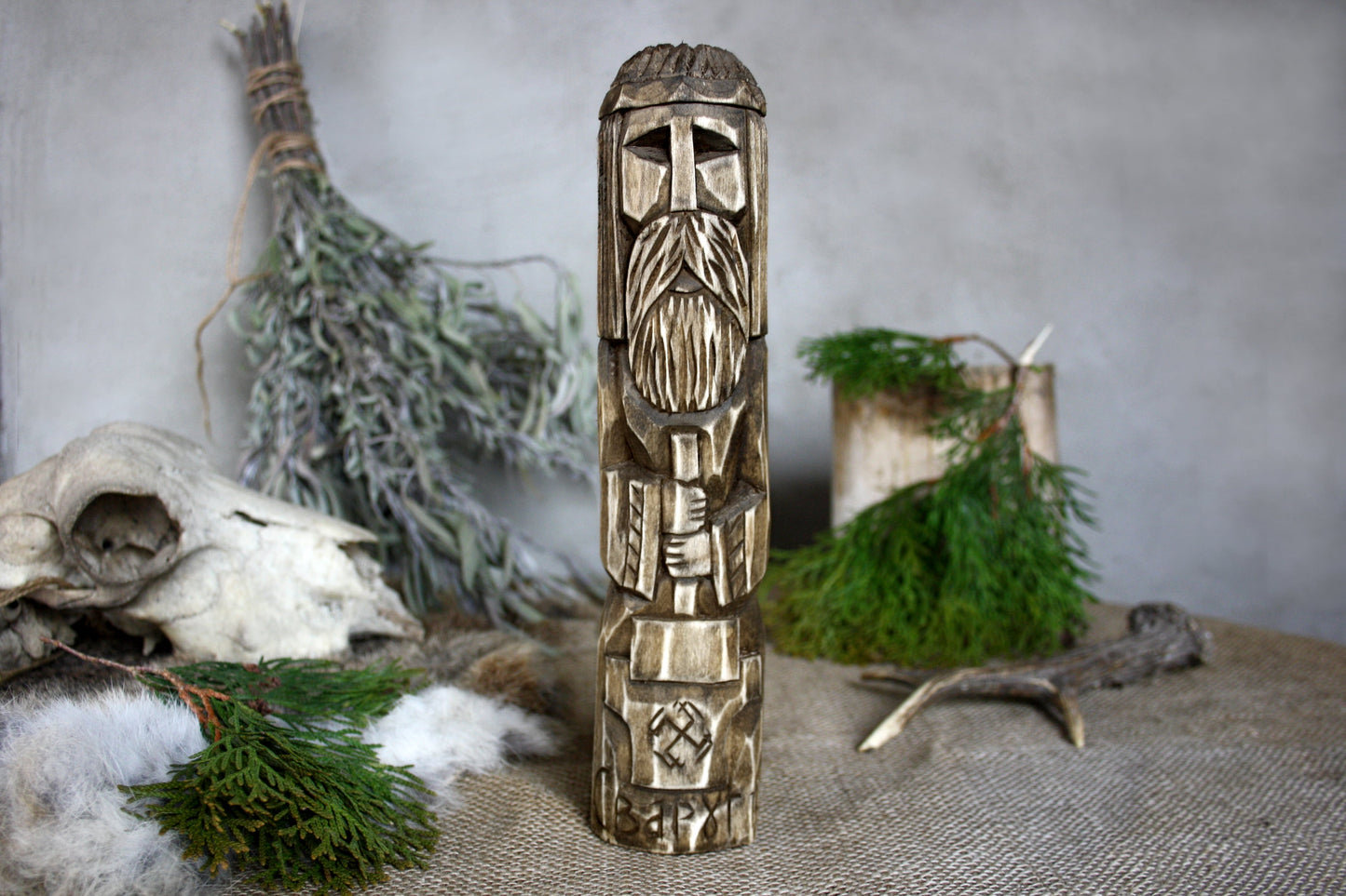 Wooden statue of Slavic God SVAROG