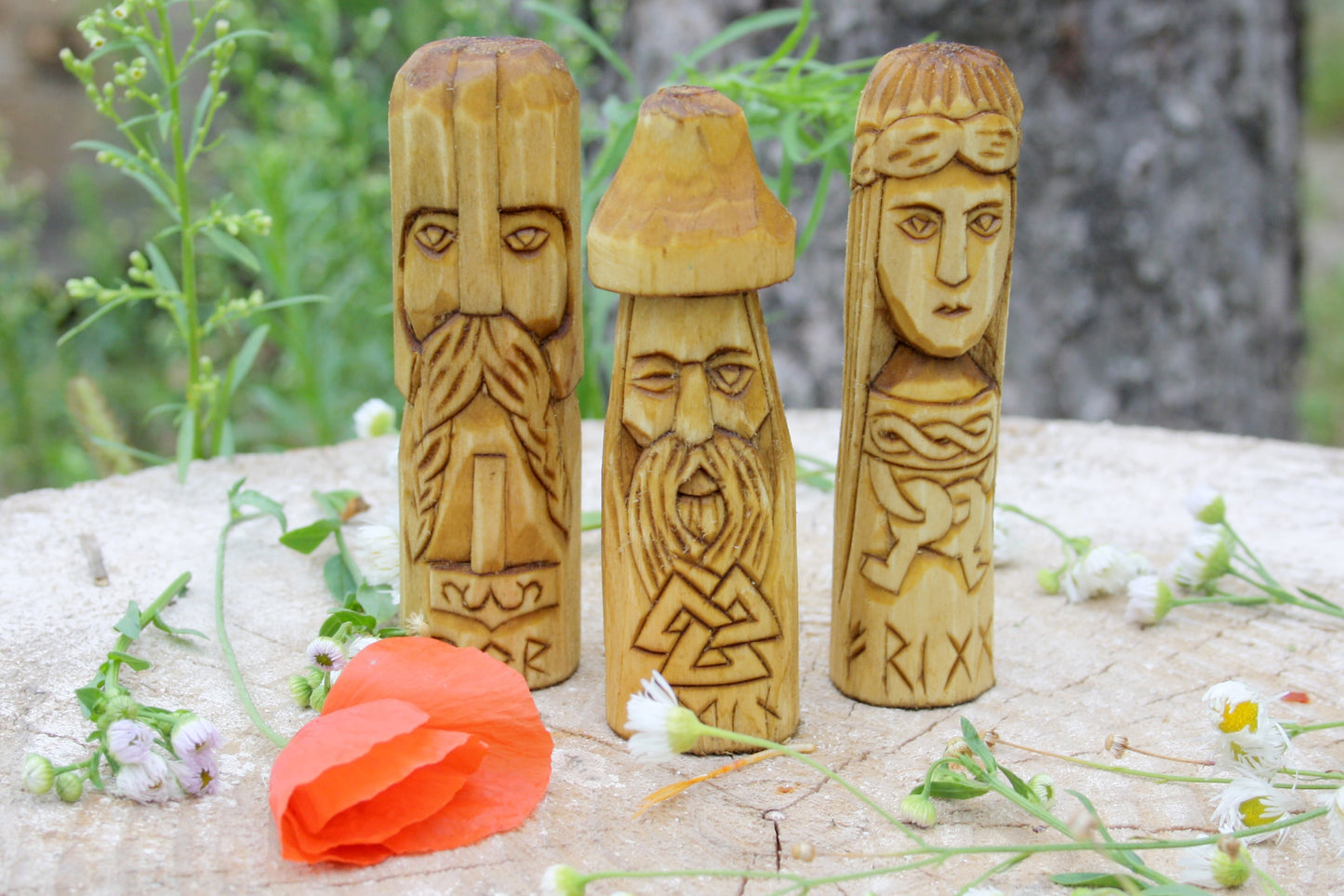 Small wooden figurine of Norse Pantheon of gods.Scandinavian altar.