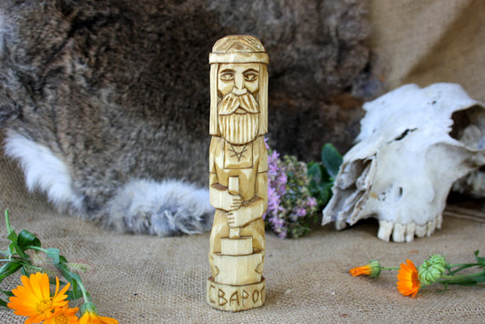 Wooden figurine of Slavic God SVAROG