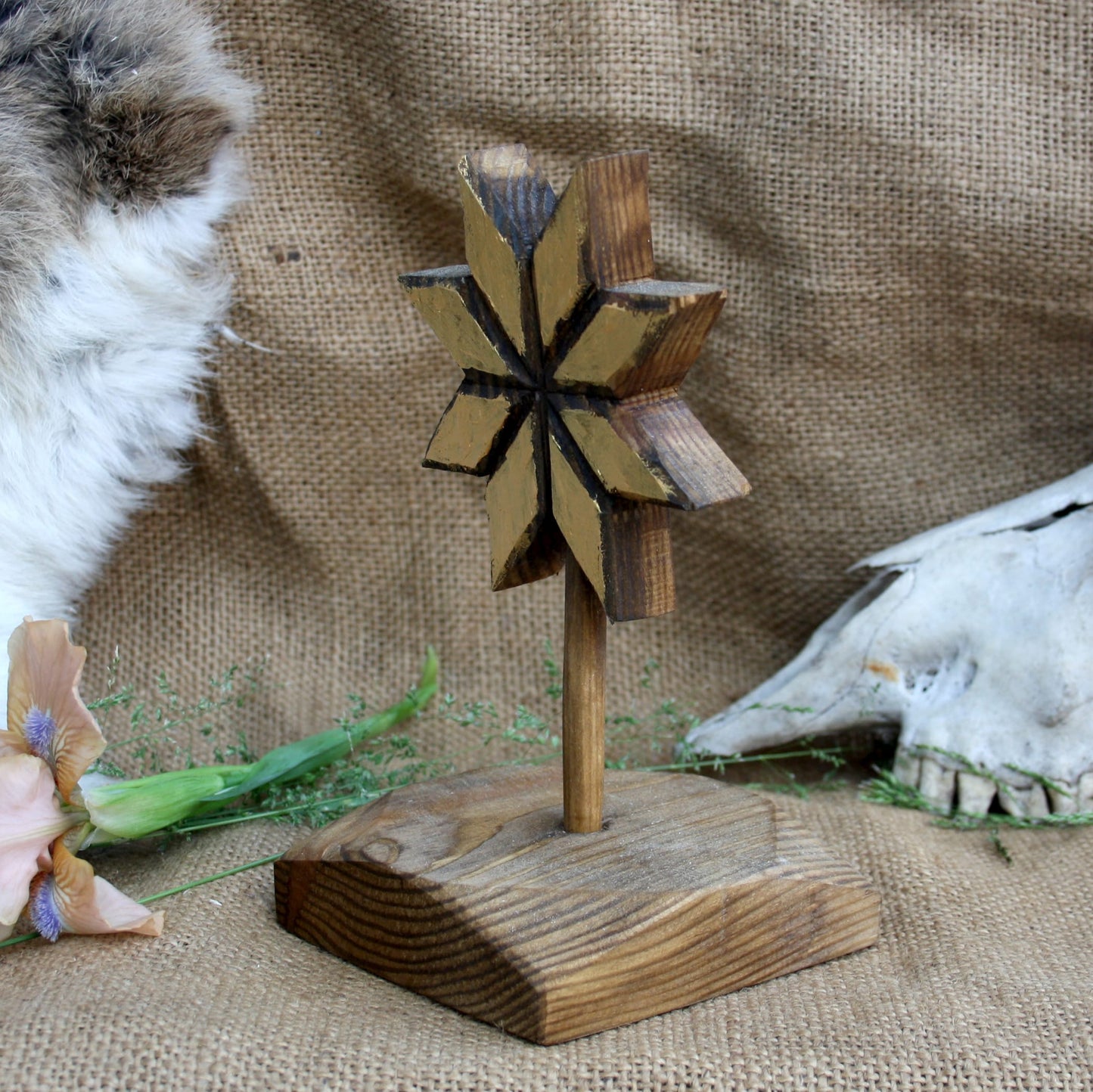 Side view of freestanding wooden Alatyr Slavic symbol