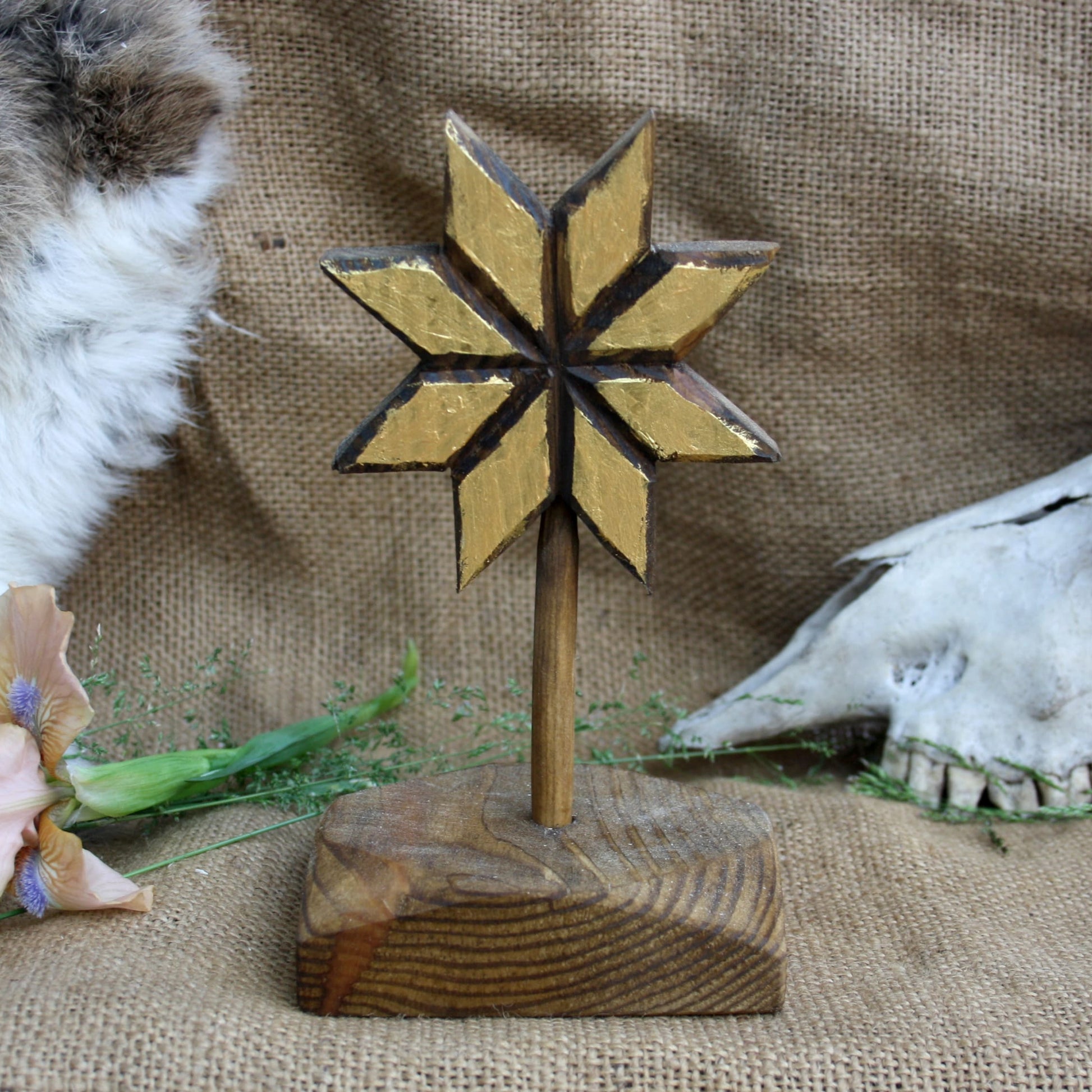 Hand carved wooden Alatyr Slavic symbol with gold finish on wooden stand