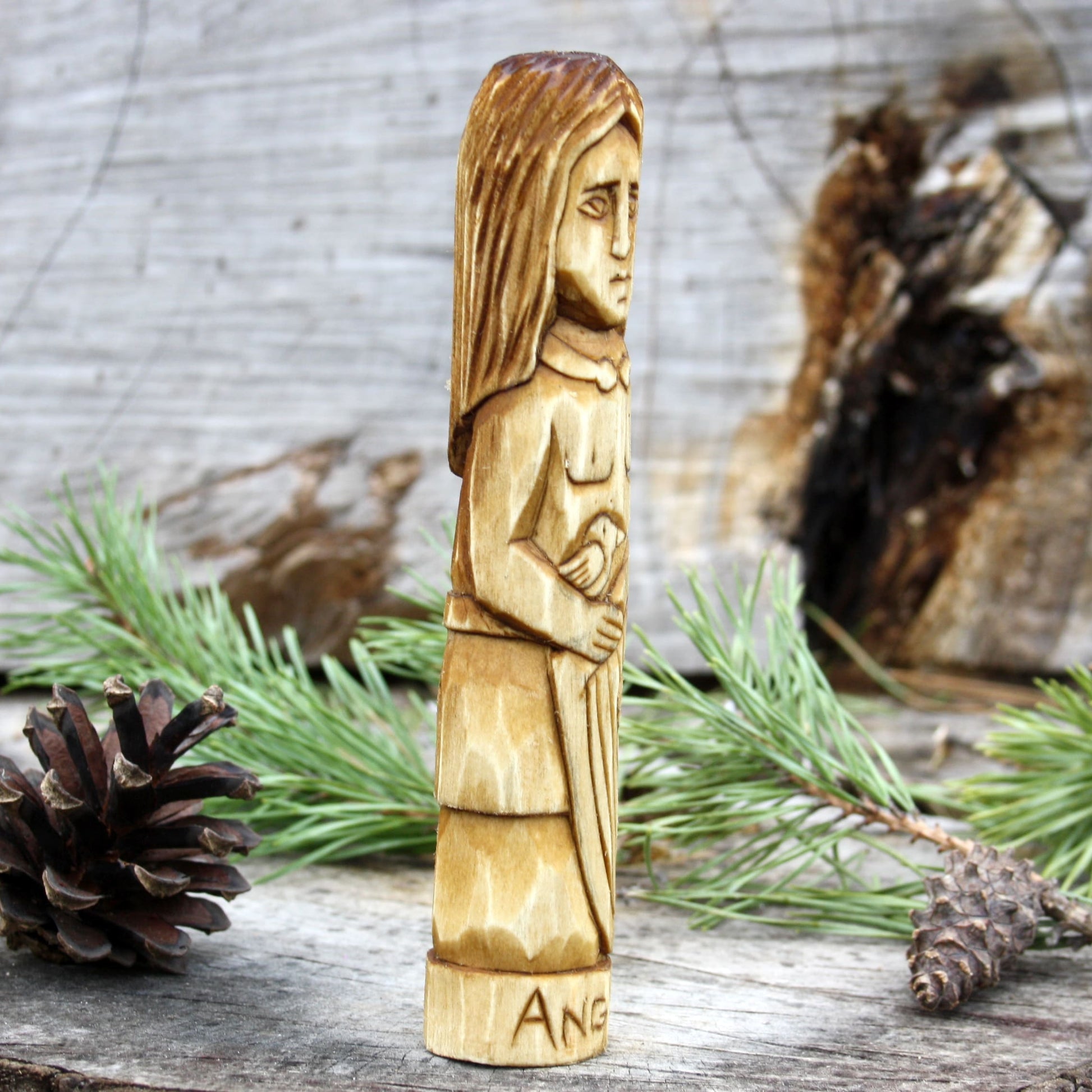 Angus Celtic god of love and youth 15cm hand-carved wooden statue side view