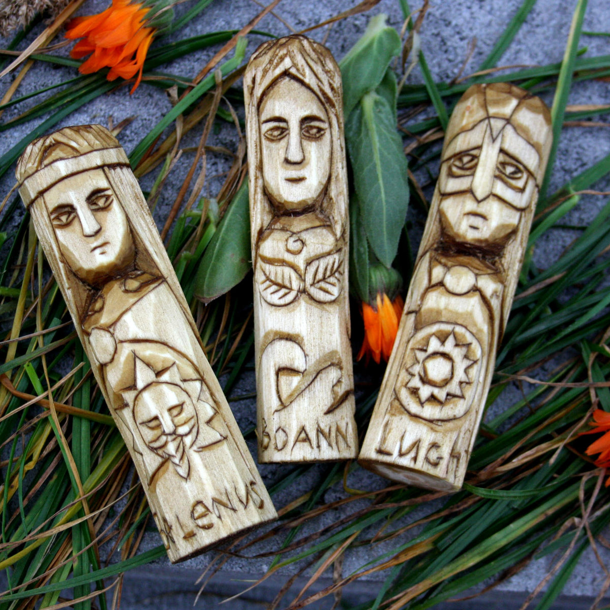 Three 10 cm hand-carved Celtic wooden figures of Belenus, Boann and Lugh