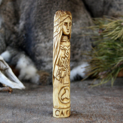Caireen Celtic goddess of protection 15cm hand-carved wooden statue side view