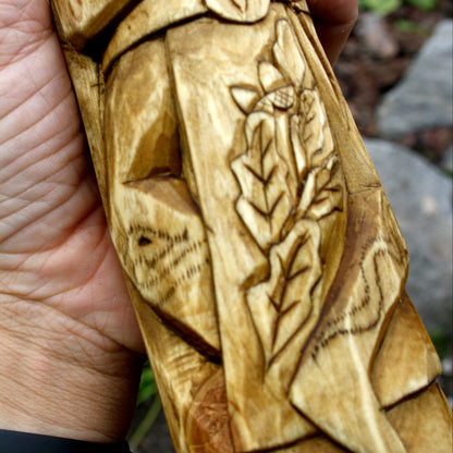 Close-up of the intricate carving on a handmade Cernunnos Celtic sculpture