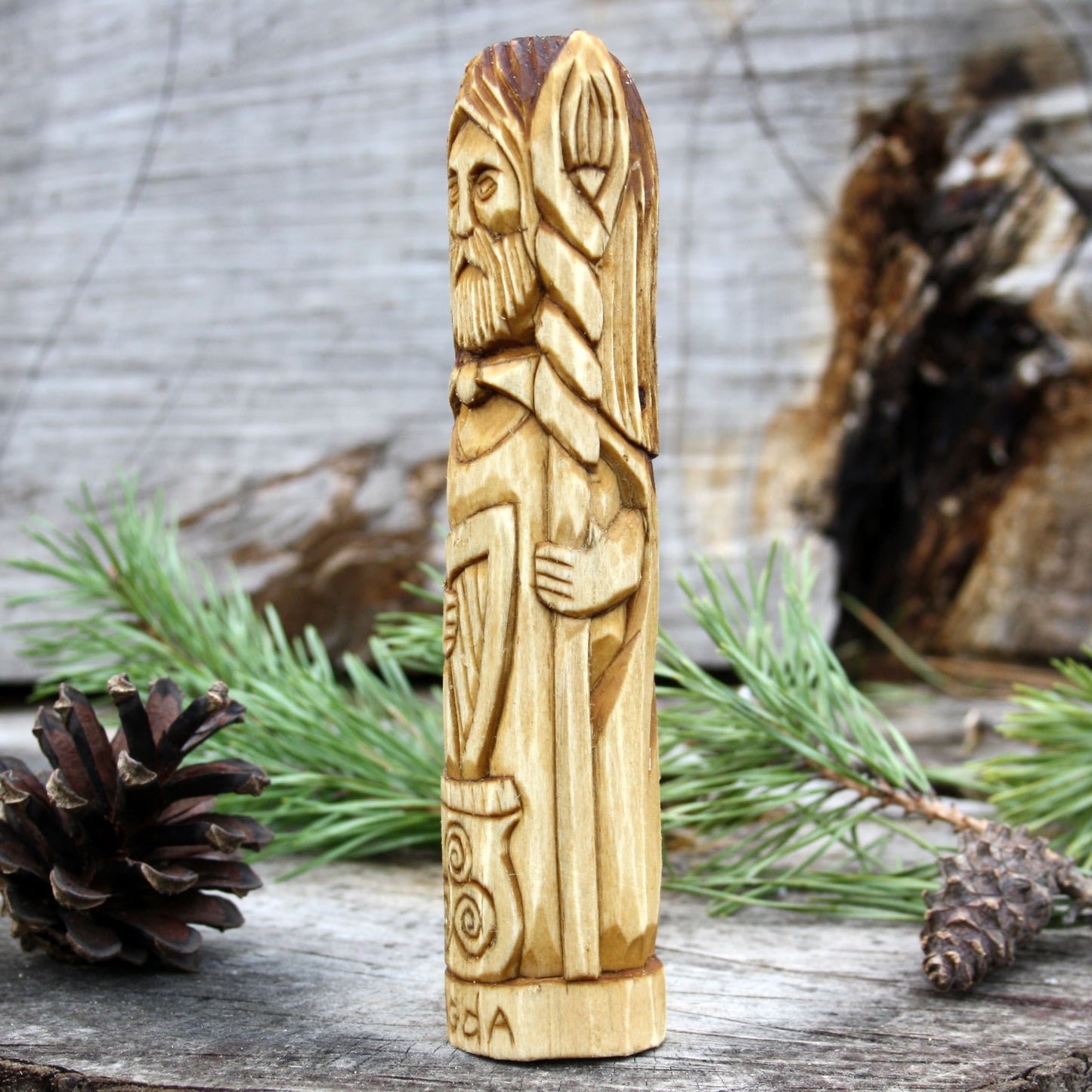 Dagda Celtic god of strength and magic 15cm hand-carved wooden statue side view