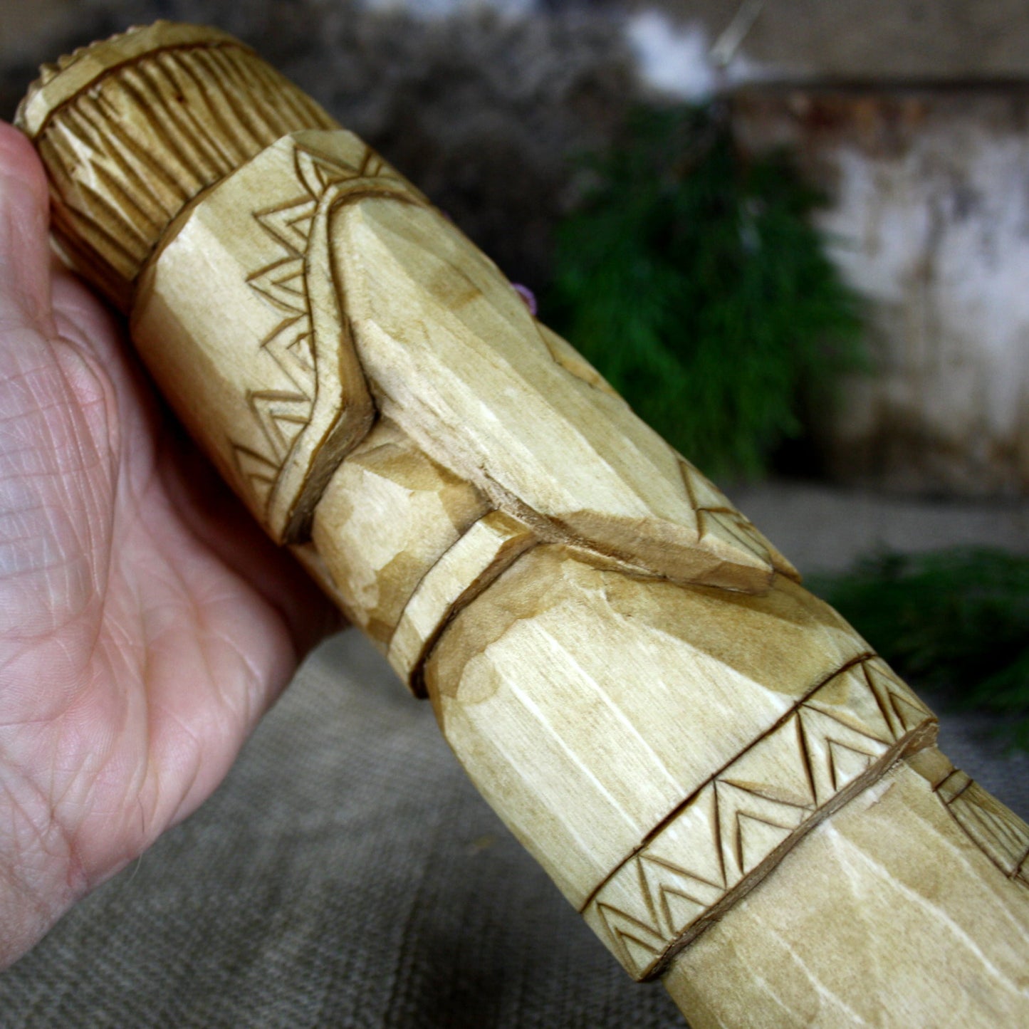 Close-up of natural wood grain on Dazhbog Slavic God statue