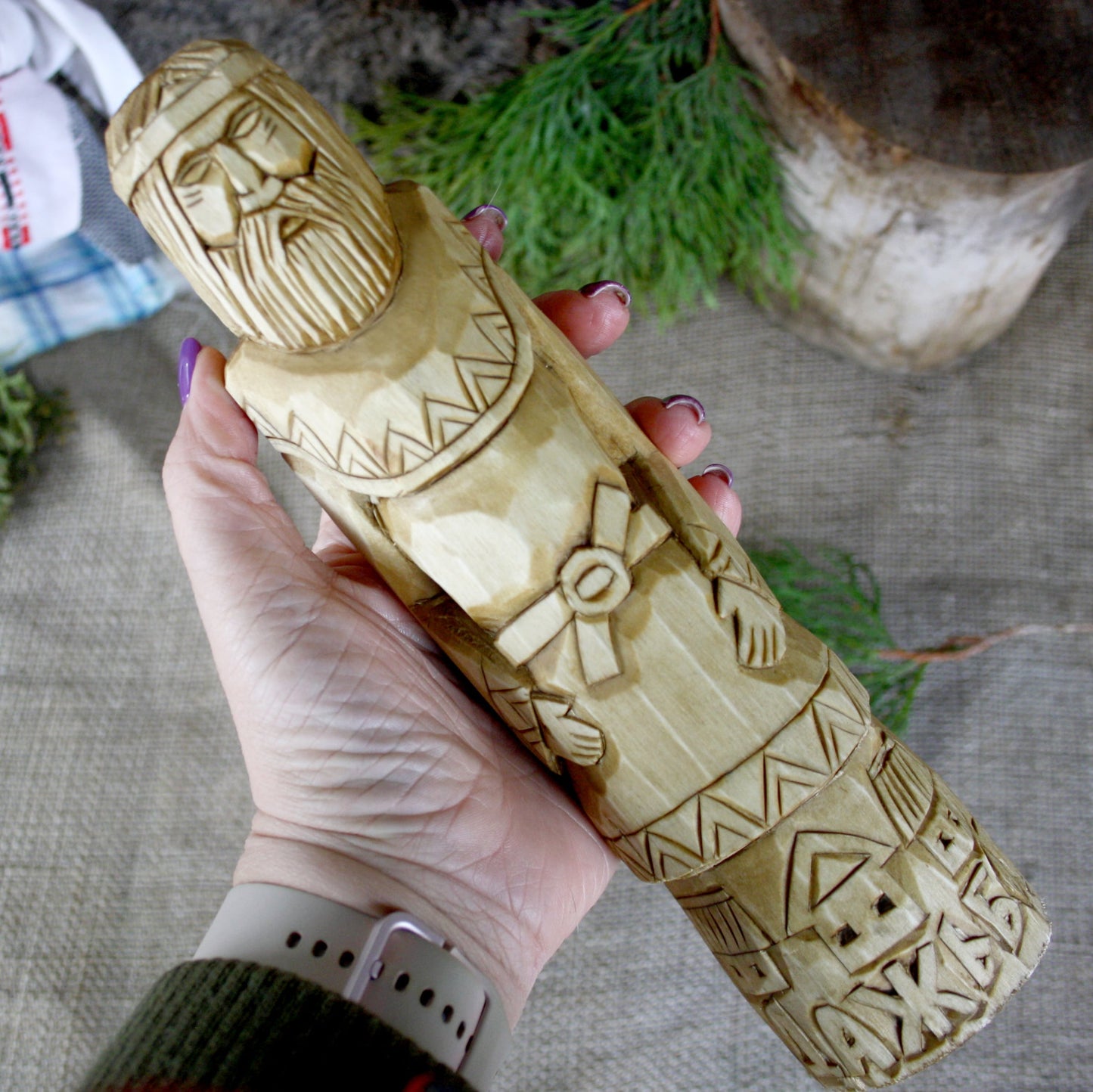 Dazhbog Slavic God wooden statue held in hand for size comparison