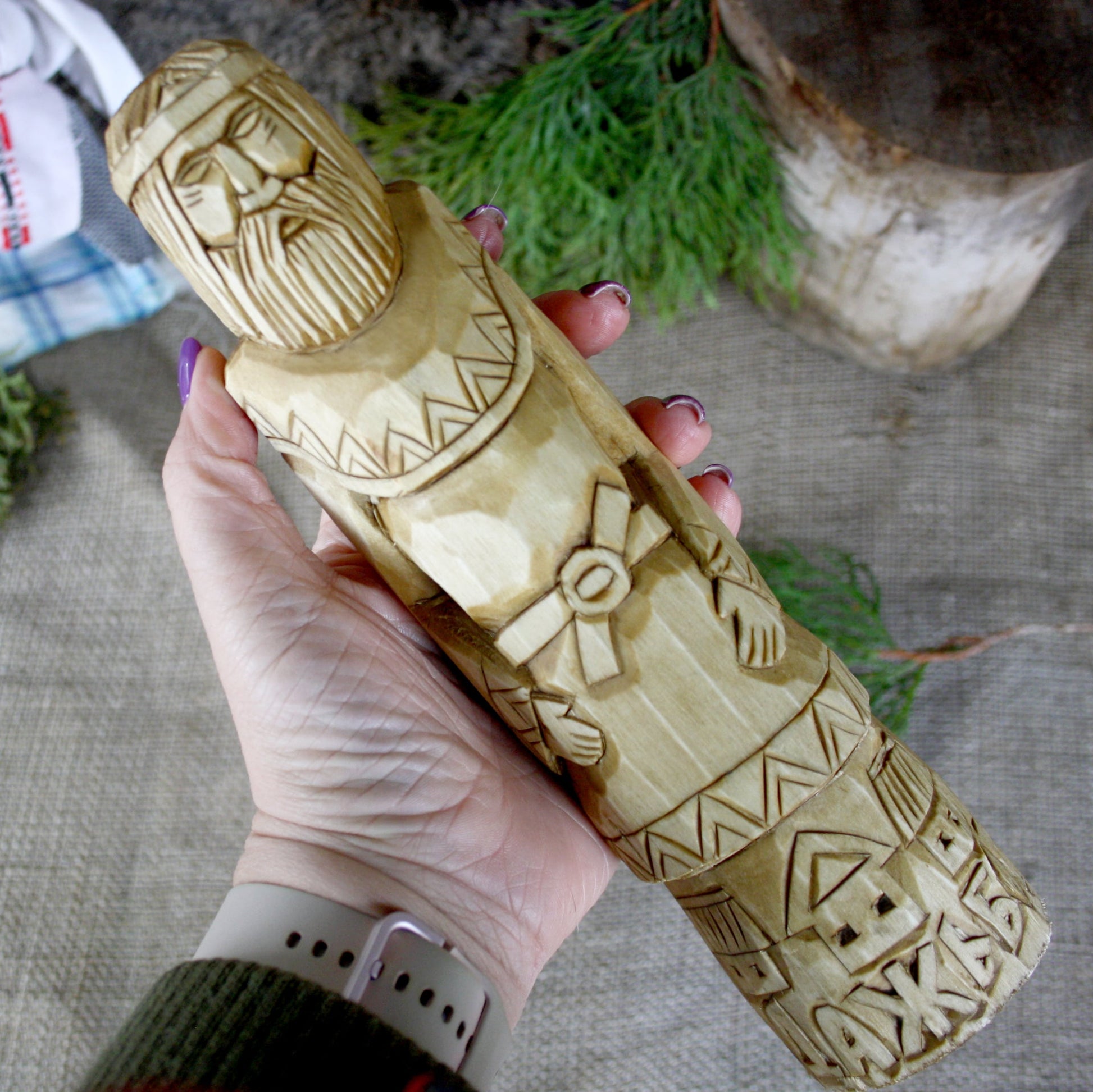 Dazhbog Slavic God wooden statue held in hand for size comparison