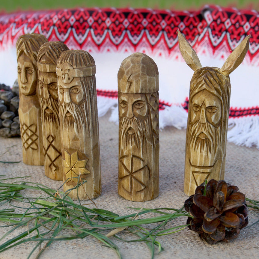 Set of five hand carved Slavic wooden idols 10 cm left side view