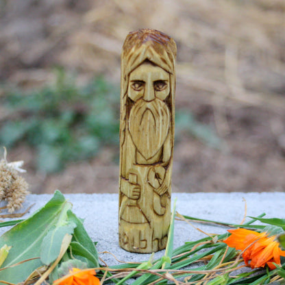Hand-carved wooden Goibhniu figurine representing the smith of Irish mythology