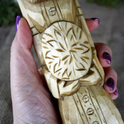 Detailed carving of Khors Slavic God wooden statue