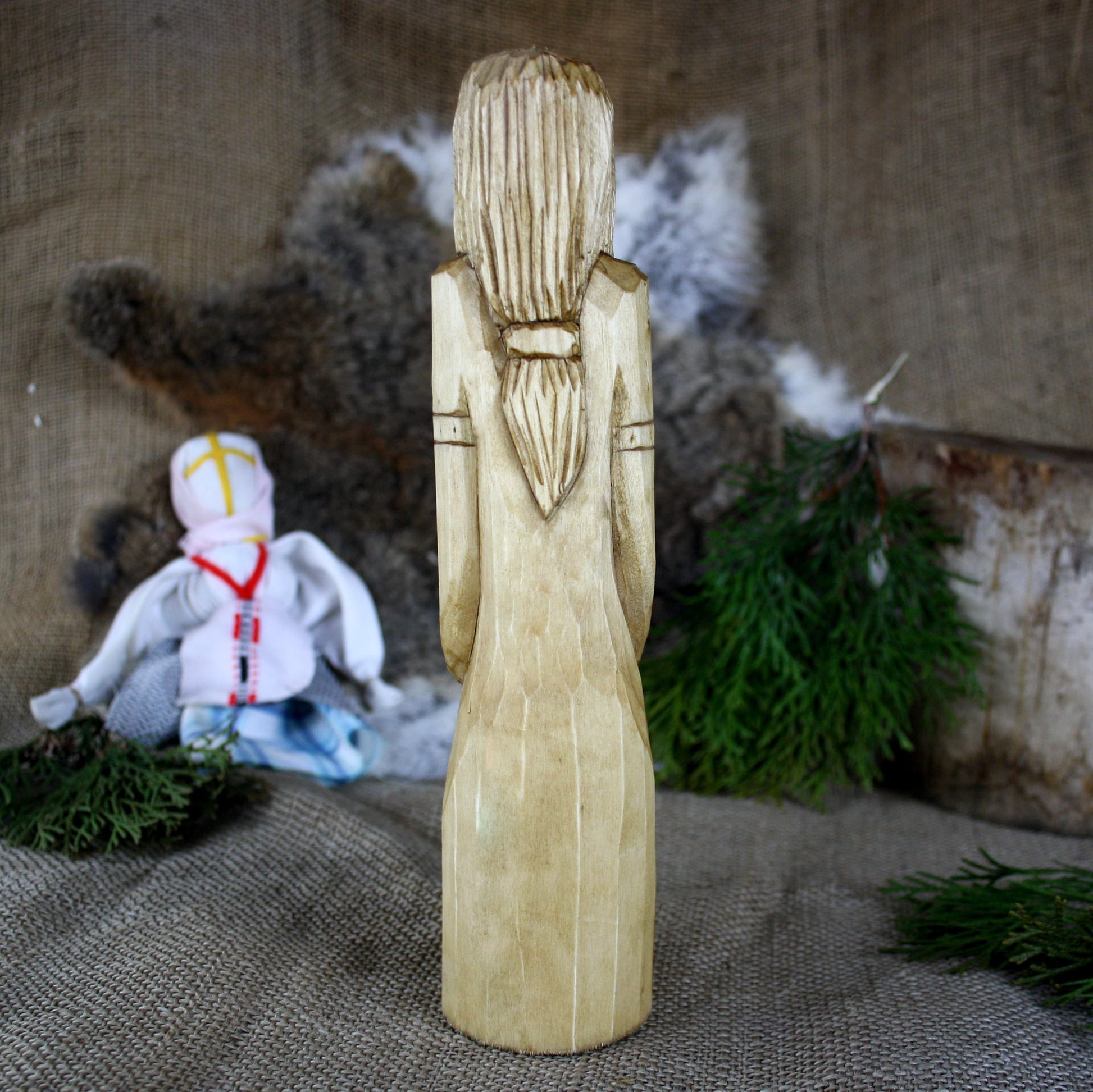 Back view of Khors Slavic God wooden statue 25 cm