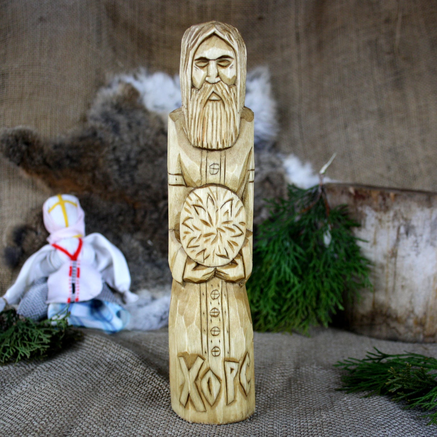 Front view of Khors Slavic God wooden statue 25 cm hand carved from linden wood