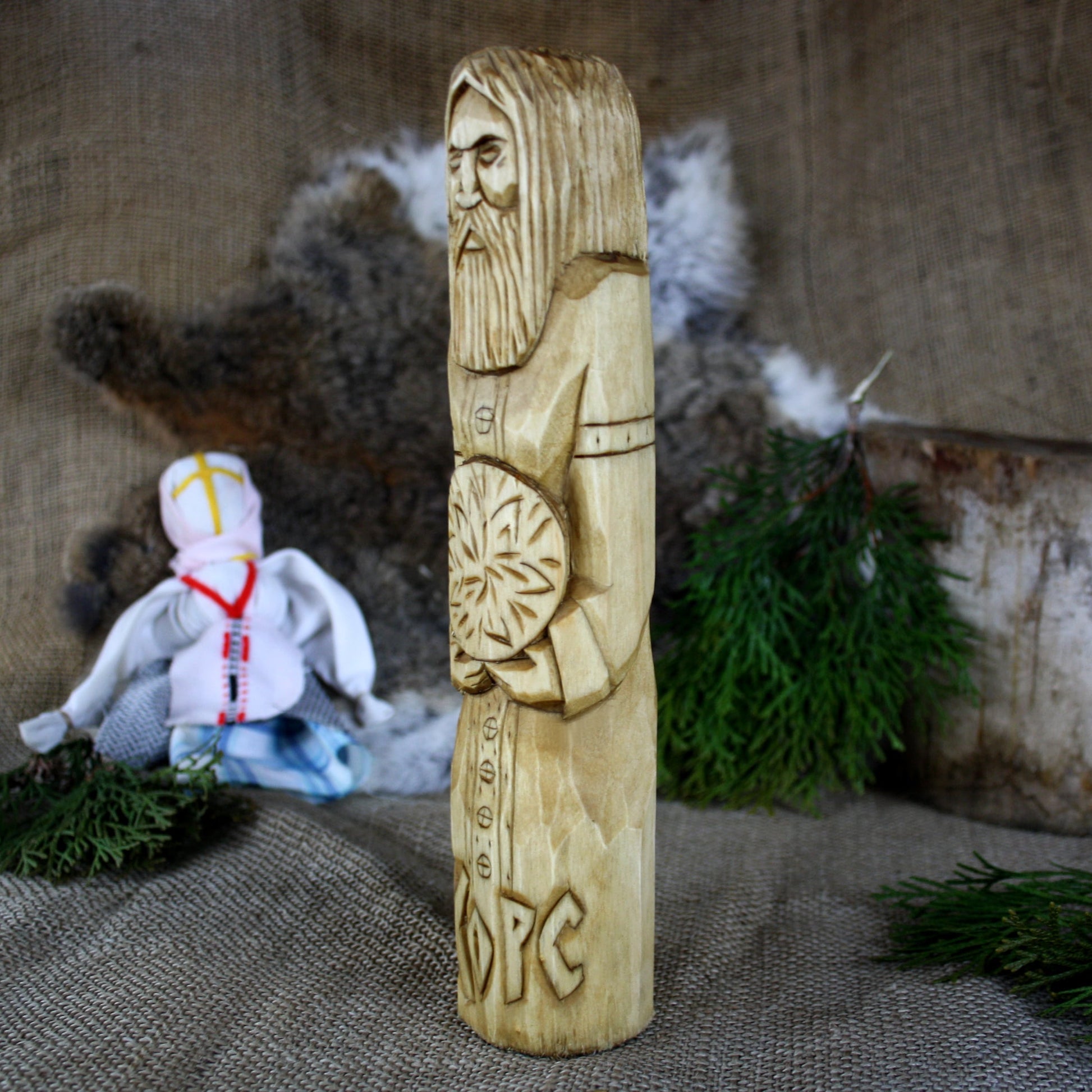 Left side of Khors Slavic God wooden statue handcrafted from linden wood