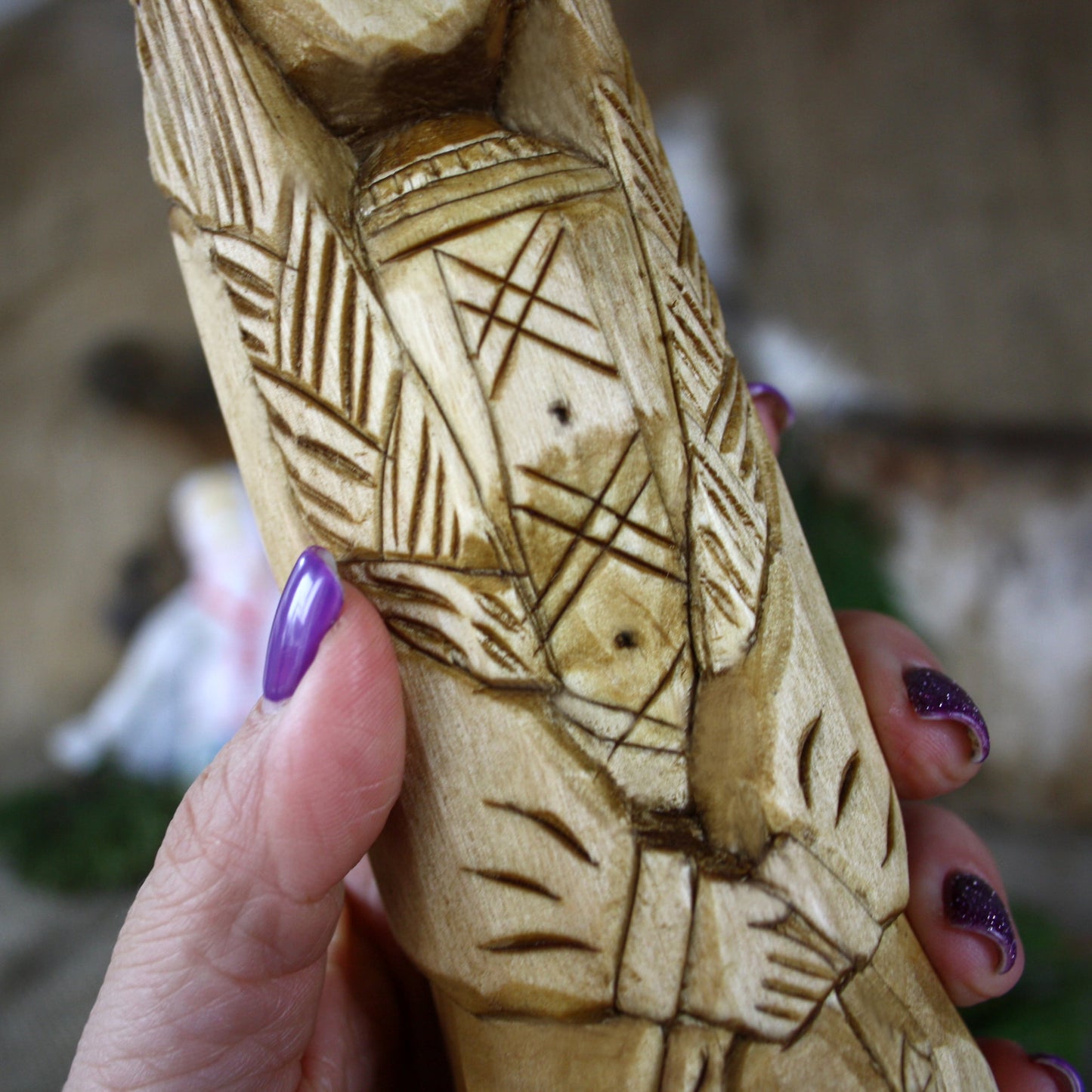 Detailed carving of Lada Slavic Goddess wooden statue