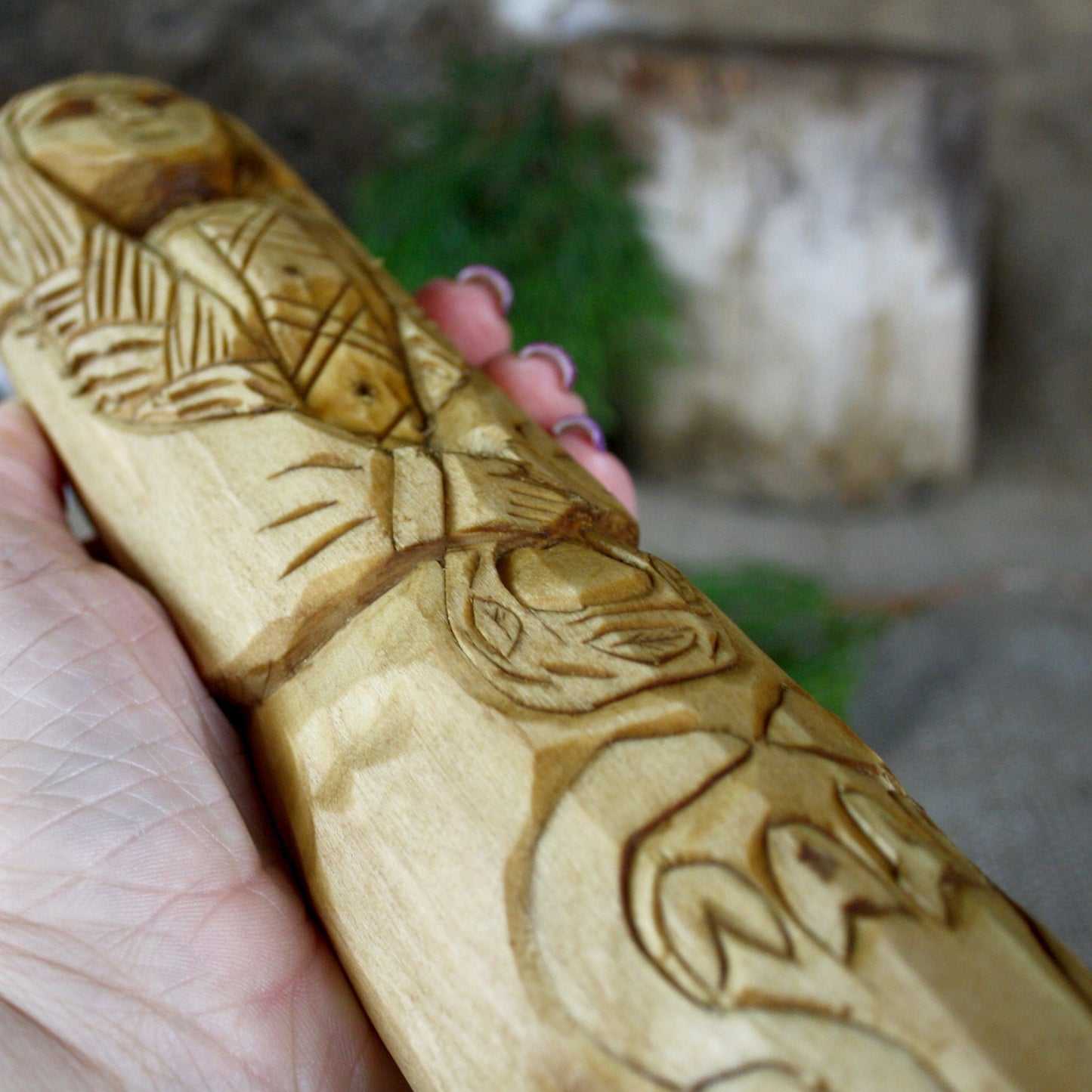 Close-up of natural wood grain on Lada Slavic Goddess statue