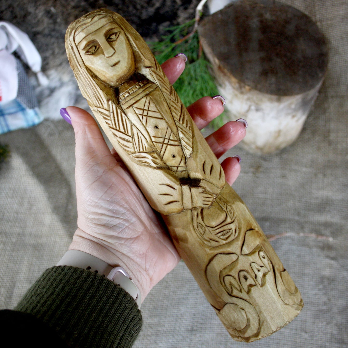 Lada Slavic Goddess wooden statue held in hand for size comparison