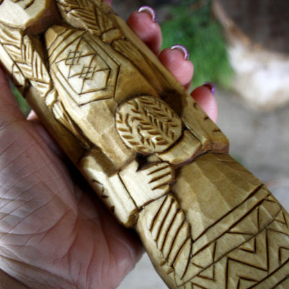 Detailed carving of Makosh Slavic Goddess wooden statue