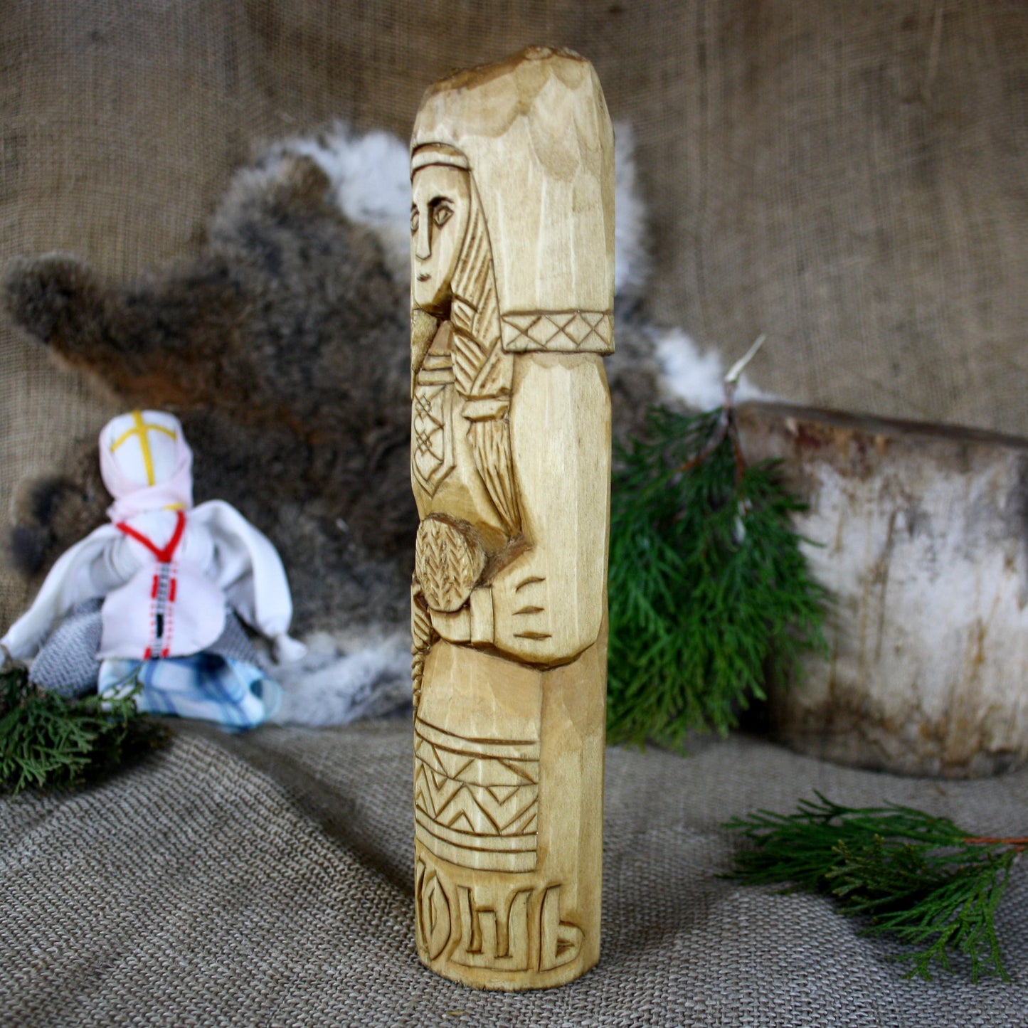 Left side of Makosh Slavic Goddess wooden statue handcrafted from linden wood