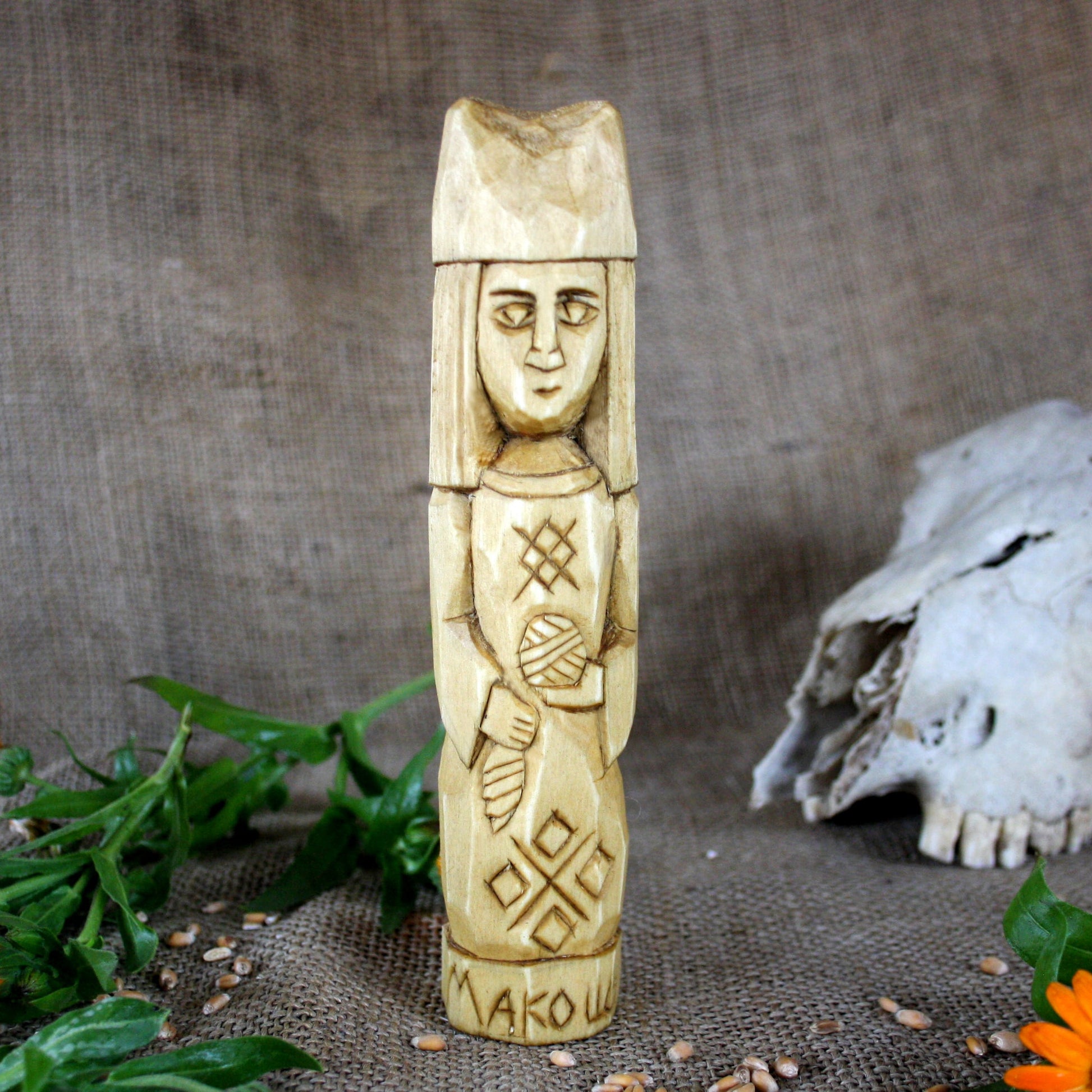 Front view of Makosh Slavic wooden idol 18 cm hand carved from linden wood