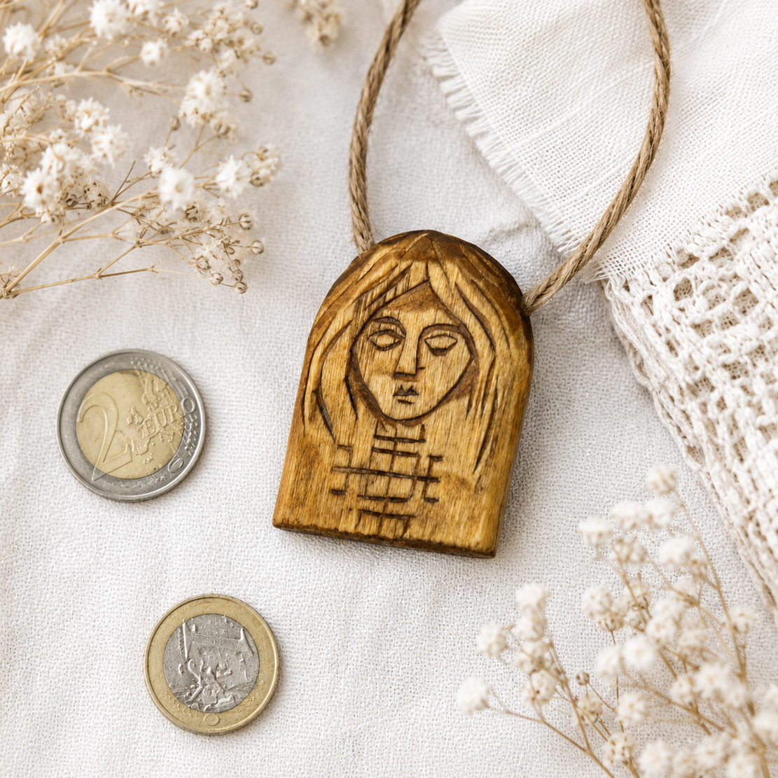 Hand carved Makosh wooden pendant made from natural linden wood
