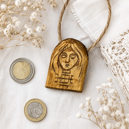 Hand carved Makosh wooden pendant made from natural linden wood