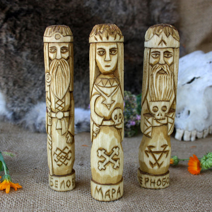 Slavic gods Morana statue with Belobog and ChernobogSlavic gods wooden figurines