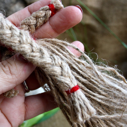 Close-up of handmade thread weaving on Ukrainian Motanka Doll
