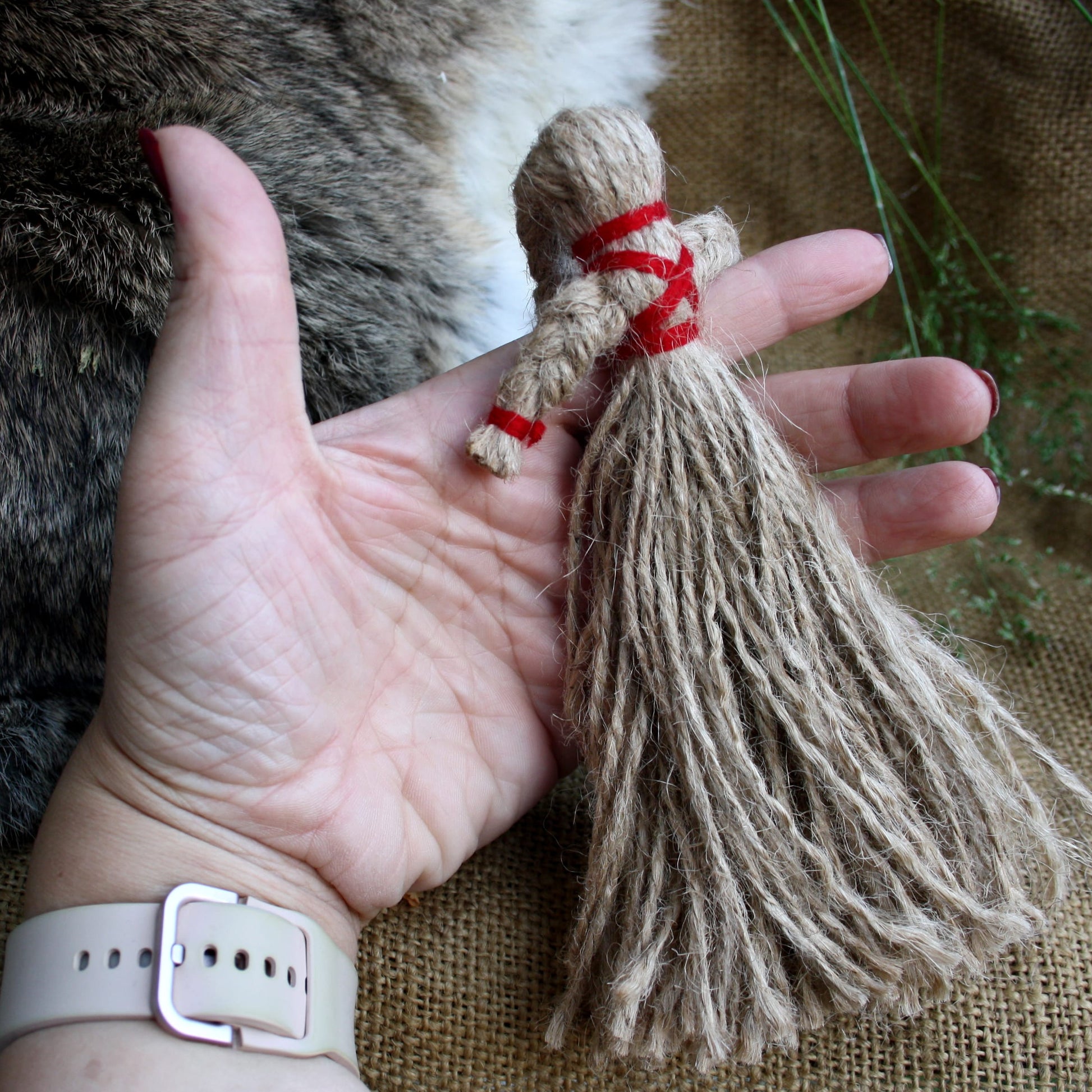 Side view of traditional Ukrainian Motanka Doll made from natural threads